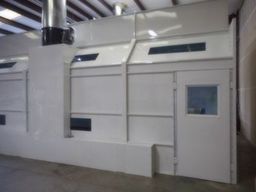 Side view of side down draft paint booth.