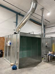 Open Face Spray booth that captures overspray in the exhaust filter.